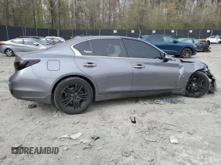 2014 Infiniti Q50 Premium with VIN JN1BV7AP2EM674992, listed as a Copart auction lot 52479915 with 220,813 mi miles and Salvage Title. Bid and sale history available at carsss.com. Image 3.