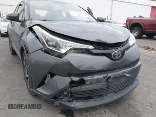 2019 Toyota C-HR XLE with VIN JTNKHMBX5K1035676, listed as a IAAI auction lot 41161562 with 185,962 mi miles. Bid and sale history available at carsss.com. Image 6.
