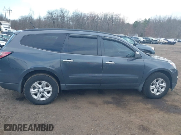 2014 Chevrolet Traverse LS z VIN 1GNKVFKD3EJ187997, wystawiony jako IAAI lot #41834781 z przebiegiem 150 994 mil mil oraz . Historia ofert i sprzedaży dostępna na DreamBid. Obrazek 13.
