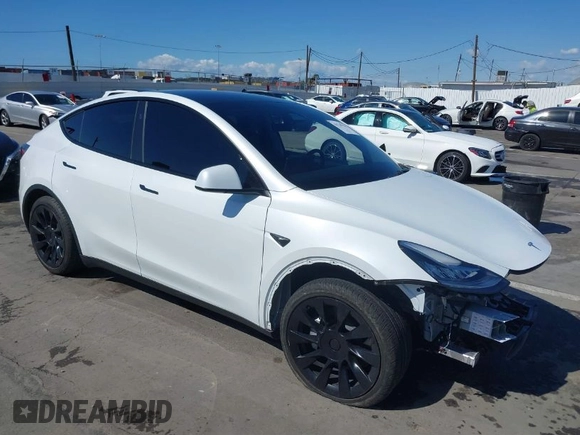 2023 Tesla Model Y Long Range with VIN 7SAYGDEEXPA129790, listed as a IAAI auction lot 41735721 with 20,402 mi miles and . Bid and sale history available at DreamBid. Image 1.