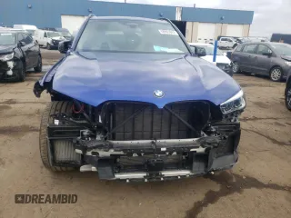 2021 BMW X5 M z VIN 5YMJU0C08M9H05967, wystawiony jako Copart lot #68961842 z przebiegiem 20 307 mil mil oraz . Historia ofert i sprzedaży dostępna na DreamBid. Obrazek 5.