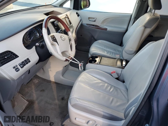 2013 Toyota Sienna XLE with VIN 5TDDK3DC7DS057882, listed as a Copart auction lot 47300525 with 147,990 mi miles and Salvage Title. Bid and sale history available at DreamBid. Image 7.
