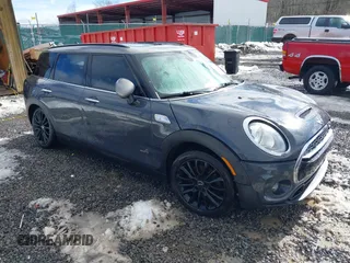 2017 MINI Clubman Cooper S with VIN WMWLU5C54H2E82400, listed as a IAAI auction lot 41536878 with 80,839 mi miles. Bid and sale history available at carsss.com. Image 1.