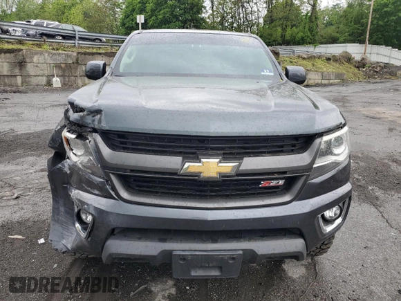 2015 Chevrolet Colorado 4WD Z71 with VIN 1GCGTCE35F1272962, listed as a Copart auction lot 55525325 with 129,701 mi miles and Salvage title. Bid and sale history available at DreamBid. Image 5.