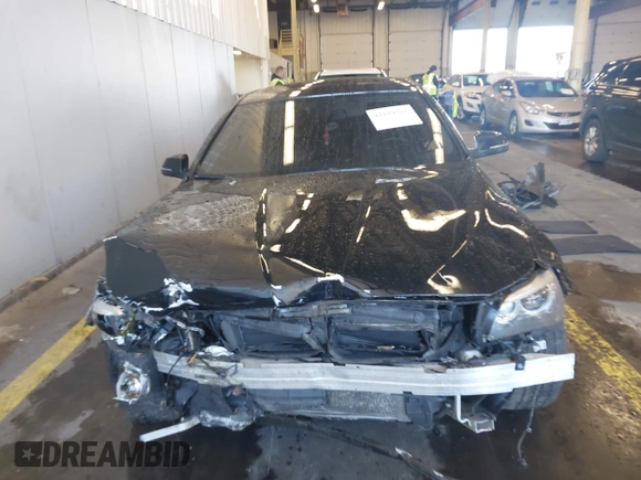 2016 BMW 5 Series 528i z VIN WBA5A5C58GG348604, wystawiony jako IAAI lot #41119325 z przebiegiem 97 798 mil mil oraz . Historia ofert i sprzedaży dostępna na DreamBid. Obrazek 13.