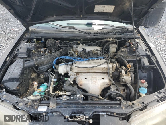 1996 Honda Accord LX with VIN 1HGCD563XTA057869, listed as a Copart auction lot 46426565 with 211,969 mi miles and Salvage Title. Bid and sale history available at DreamBid. Image 11.