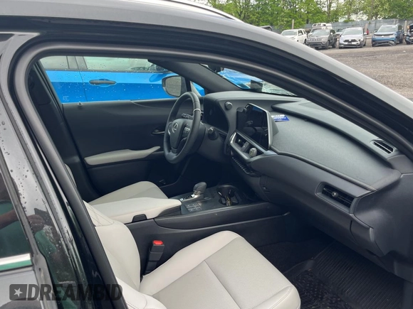2025 Lexus UX 300h with VIN JTHUCJDH8S2003698, listed as a Copart auction lot 56182345 with 1,111 mi miles and Salvage title. Bid and sale history available at DreamBid. Image 5.