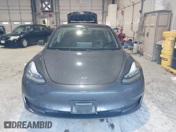 2018 Tesla Model 3 Long Range Battery with VIN 5YJ3E1EB1JF145520, listed as a IAAI auction lot 41360939 with 95,010 mi miles and . Bid and sale history available at DreamBid. Image 12.