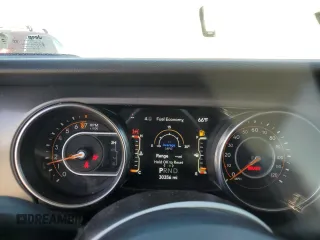 2023 Jeep Gladiator Sport S с VIN 1C6HJTAG3PL552959, выставлен на аукционе Copart как лот 56905635 с пробегом 30 356 миль миль и Списание • Salvage title. История ставок и продаж доступна на DreamBid. Изображение 9.