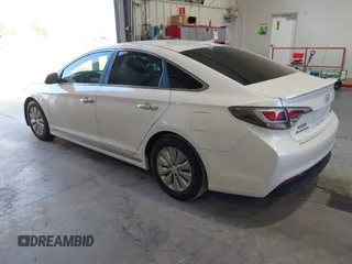 2016 Hyundai Sonata Hybrid SE with VIN KMHE24L15GA009241, listed as a IAAI auction lot 42083395 with 127,068 mi miles. Bid and sale history available at carsss.com. Image 3.