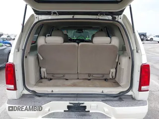 2005 Cadillac Escalade z VIN 1GYEK63N25R190908, wystawiony jako IAAI lot #41882135 z przebiegiem 243 333 mil mil oraz . Historia ofert i sprzedaży dostępna na DreamBid. Obrazek 17.