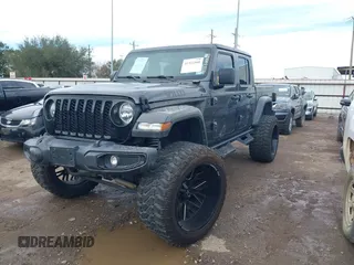 2023 Jeep Gladiator Sport S z VIN 1C6HJTAG9PL554845, wystawiony jako IAAI lot #41312360 z przebiegiem 18 077 mil mil oraz . Historia ofert i sprzedaży dostępna na DreamBid. Obrazek 18.