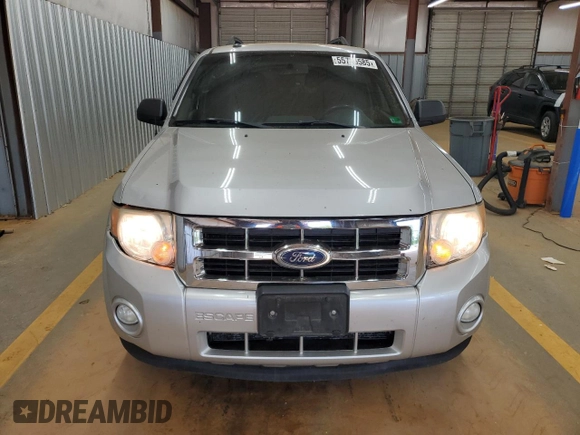 2010 Ford Escape XLT с VIN 1FMCU9D76AKB94757, выставлен на аукционе Copart как лот 55735585 с пробегом 175 030 миль миль и Списание • Salvage title. История ставок и продаж доступна на DreamBid. Изображение 5.