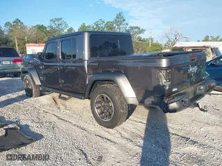 2023 Jeep Gladiator Overland with VIN 1C6HJTFG1PL546604, listed as a IAAI auction lot 41599632 with 23,108 mi miles. Bid and sale history available at carsss.com. Image 3.