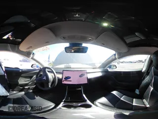 2020 Tesla Model 3 Standard Range Plus with VIN 5YJ3E1EA1LF590396, listed as a IAAI auction lot 41868089 with 51,278 mi miles. Bid and sale history available at carsss.com. Image 20.