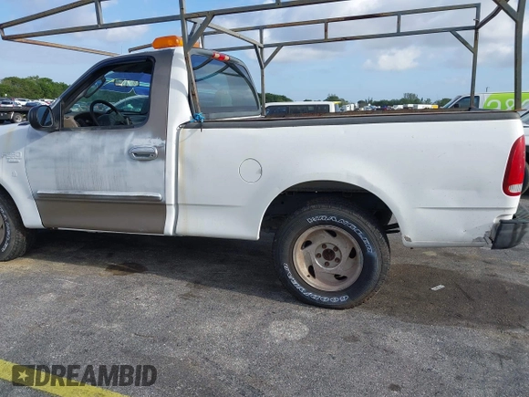 2002 Ford F-150 XL with VIN 1FTRF17W52NB71693, listed as a IAAI auction lot 41952405 with 121,917 mi miles. Bid and sale history available at carsss.com. Image 6.