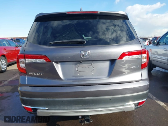 2019 Honda Pilot Touring 7-Passenger z VIN 5FNYF5H65KB020420, wystawiony jako IAAI lot #41575972 z przebiegiem 48 950 mil mil oraz . Historia ofert i sprzedaży dostępna na DreamBid. Obrazek 16.