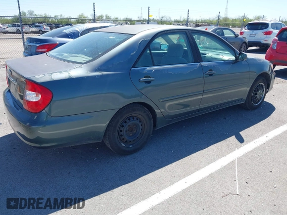 2003 Toyota Camry LE with VIN 4T1BE32K43U665972, listed as a IAAI auction lot 41858017 with 143,137 mi miles and . Bid and sale history available at DreamBid. Image 4.
