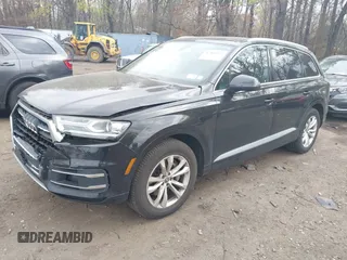 2019 Audi Q7 Premium with VIN WA1AAAF74KD002299, listed as a IAAI auction lot 42066717 with 91,898 mi miles and . Bid and sale history available at DreamBid. Image 17.