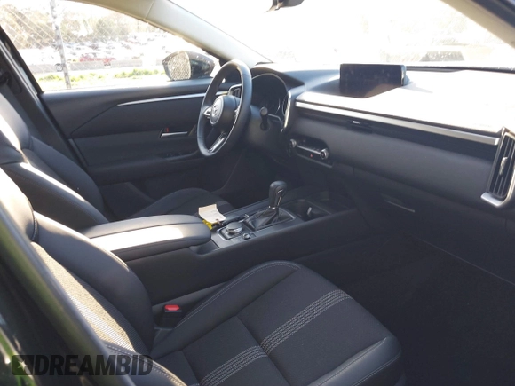 2024 Mazda CX-50 S Select with VIN 7MMVABAM9RN238672, listed as a IAAI auction lot 41854020 with 4,953 mi miles and . Bid and sale history available at DreamBid. Image 5.