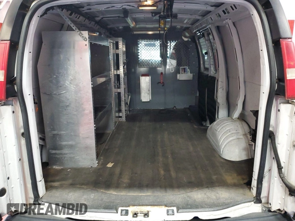 2013 Chevrolet Express Cargo z VIN 1GCSGAFX2D1138833, wystawiony jako IAAI lot #42521021 z przebiegiem 103 313 mil mil oraz . Historia ofert i sprzedaży dostępna na DreamBid. Obrazek 13.