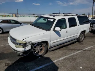 2005 Chevrolet Suburban LS z VIN 3GNEC16Z15G113135, wystawiony jako Copart lot #74137674 z przebiegiem 217 387 mil mil oraz Szkoda całkowita • Salvage title. Historia ofert i sprzedaży dostępna na DreamBid. Obrazek 1.