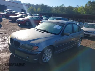 2004 BMW 3 Series 325i with VIN WBAEV33434KR33499, listed as a IAAI auction lot 41874981 with 216,828 mi miles. Bid and sale history available at carsss.com. Image 2.