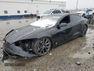 2021 Tesla Model S Long Range Plus z VIN 5YJSA1E2XMF427618, wystawiony jako Copart lot #41654955 z przebiegiem Nie podano mil oraz Szkoda całkowita • Salvage title. Historia ofert i sprzedaży dostępna na DreamBid. Obrazek 1.