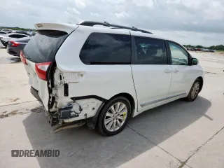 2015 Toyota Sienna XLE with VIN 5TDYK3DC4FS617099, listed as a Copart auction lot 61128025 with 114,508 mi miles and Salvage title. Bid and sale history available at DreamBid. Image 3.