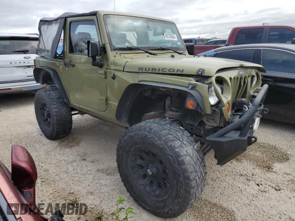 2013 Jeep Wrangler Rubicon z VIN 1C4HJWCG1DL574039, wystawiony jako Copart lot #48728645 z przebiegiem 116 537 mil mil oraz Szkoda całkowita • Salvage title. Historia ofert i sprzedaży dostępna na DreamBid. Obrazek 4.