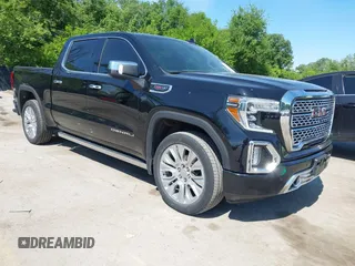 2021 GMC Sierra 1500 Denali z VIN 1GTU9FEL4MZ253708, wystawiony jako IAAI lot #42209839 z przebiegiem 52 279 mil mil oraz . Historia ofert i sprzedaży dostępna na DreamBid. Obrazek 1.