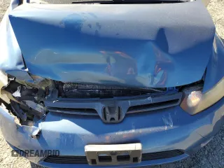 2007 Honda Civic Cpe LX with VIN 2HGFG12657H563632, listed as a Copart auction lot 73558664 with 166,144 mi miles and Salvage Title. Bid and sale history available at carsss.com. Image 12.