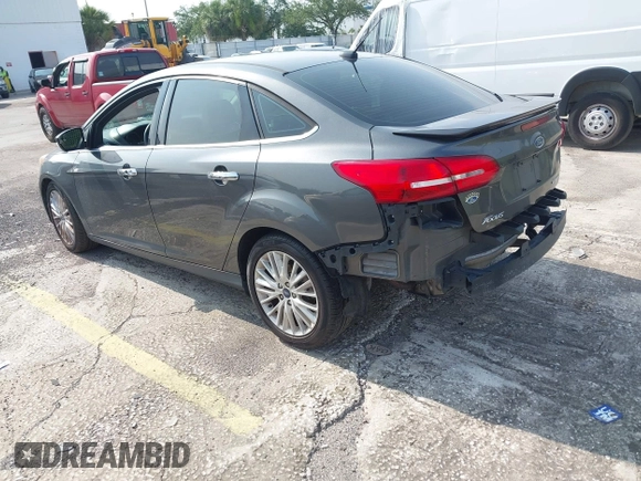 2018 Ford Focus Titanium с VIN 1FADP3J23JL272028, выставлен на аукционе IAAI как лот 42395402 с пробегом 125 975 миль миль и . История ставок и продаж доступна на DreamBid. Изображение 3.