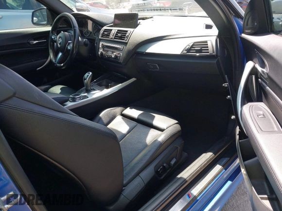 2014 BMW 2 Series M235i with VIN WBA1J7C52EVW84588, listed as a IAAI auction lot 42490194 with 103,998 mi miles and . Bid and sale history available at DreamBid. Image 5.