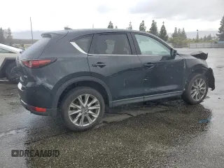 2020 Mazda CX-5 Grand Touring with VIN JM3KFADM3L0815055, listed as a Copart auction lot 48175245 with 56,602 mi miles and Salvage Title. Bid and sale history available at carsss.com. Image 3.