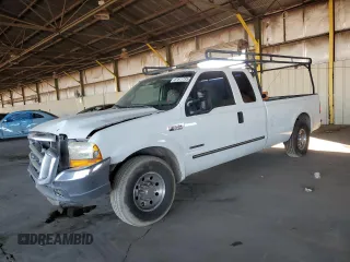 1999 Ford F-250 XL with VIN 1FTNX20FXXEE59499, listed as a Copart auction lot 87511735 with 215,520 mi miles and Salvage title. Bid and sale history available at DreamBid. Image 1.