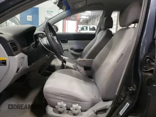 2006 Hyundai Accent GLS z VIN KMHCN46C56U036710, wystawiony jako Copart lot #84831284 z przebiegiem 202 556 mil mil oraz Nie do naprawy • Non repairable. Historia ofert i sprzedaży dostępna na DreamBid. Obrazek 7.