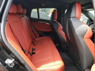 2022 BMW X4 M z VIN 5YM23EC02N9M62773, wystawiony jako Copart lot #53100254 z przebiegiem 9566 mil mil oraz Szkody całkowita. Historia ofert i sprzedaży dostępna na DreamBid. Obrazek 11.