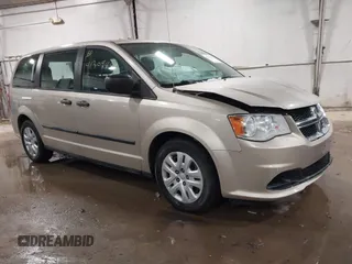 2015 Dodge Grand Caravan SE with VIN 2C4RDGBG2FR592899, listed as a IAAI auction lot 41309499 with 110,428 mi miles and . Bid and sale history available at DreamBid. Image 1.