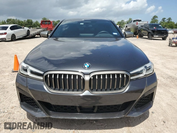 2022 BMW 5 Series M550i xDrive z VIN WBA13BK09NCJ00508, wystawiony jako Copart lot #58077634 z przebiegiem Nie podano mil oraz . Historia ofert i sprzedaży dostępna na DreamBid. Obrazek 5.