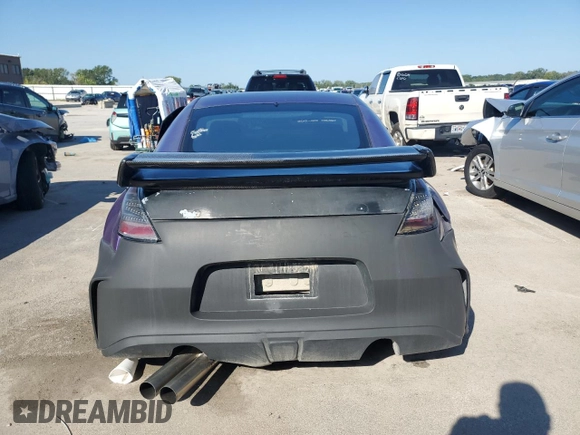 2005 Nissan 350Z with VIN JN1AZ34D05M608841, listed as a Copart auction lot 70408954 with 226,812 mi miles and Salvage Title. Bid and sale history available at DreamBid. Image 6.