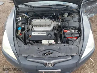 2004 Honda Accord Cpe EX with VIN 1HGCM82694A011758, listed as a IAAI auction lot 41881867 with 275,091 mi miles. Bid and sale history available at carsss.com. Image 10.