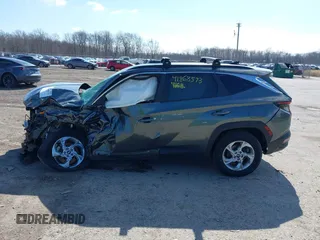 2022 Hyundai Tucson SEL with VIN 5NMJBCAE5NH137470, listed as a IAAI auction lot 41868573 with 28,034 mi miles and . Bid and sale history available at carsss.com. Image 14.
