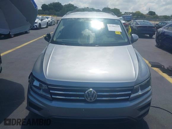 2021 Volkswagen Tiguan S with VIN 3VV1B7AX7MM117954, listed as a IAAI auction lot 42300223 with 45,587 mi miles and . Bid and sale history available at DreamBid. Image 12.