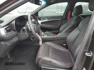 2023 Genesis G70 3.3T with VIN KMTG54TE2PU113421, listed as a Copart auction lot 46648975 with 17,375 mi miles and Salvage title. Bid and sale history available at DreamBid. Image 7.