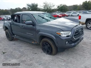2019 Toyota Tacoma 4WD SR with VIN 3TMCZ5ANXKM267804, listed as a IAAI auction lot 41499946 with 140,723 mi miles. Bid and sale history available at carsss.com. Image 1.