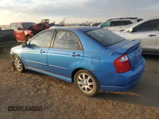 2006 Kia Spectra EX with VIN KNAFE121965262406, listed as a Copart auction lot 74614214 with 181,029 mi miles and Salvage Title. Bid and sale history available at carsss.com. Image 2.