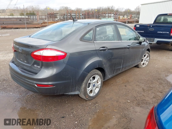 2016 Ford Fiesta SE with VIN 3FADP4BJ2GM196952, listed as a IAAI auction lot 41694838 with 121,192 mi miles and . Bid and sale history available at DreamBid. Image 4.
