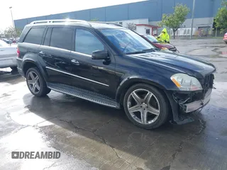 2011 Mercedes-Benz GL-Class GL 550 with VIN 4JGBF8GE5BA643105, listed as a IAAI auction lot 41526258 with 127,159 mi miles. Bid and sale history available at carsss.com. Image 1.
