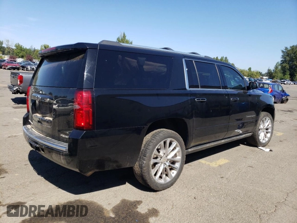 2019 Chevrolet Suburban Premier with VIN 1GNSKJKJ1KR151983, listed as a Copart auction lot 68709074 with 86,611 mi miles and Salvage Title. Bid and sale history available at DreamBid. Image 3.